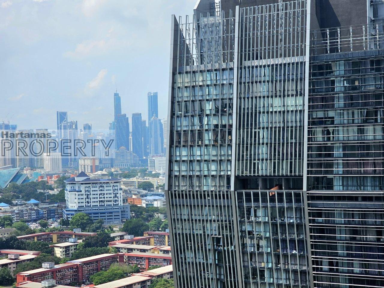 Fennel Sentul East, with a city skyline.